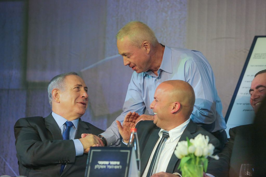 Prime Minister Benjamin Netanyahu (left) and Housing Minister Yaov Galant (standing) seen during a ceremony of signing a final agreement on building 32,000 new housing units in the southern Israeli city of Ashkelon, on October 29, 2015. (Edi Israel/Flash90) Prime Minister Benjamin Netanyahu (left) and Housing Minister Yaov Galant (standing) seen during a ceremony of signing a final agreement on building 32,000 new housing units in the southern Israeli city of Ashkelon, on October 29, 2015. (Edi Israel/Flash90)