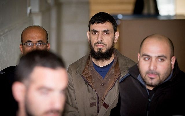 Khaled Koutineh, who ran over and killed Shalom Sherki last April, is brought to the Jerusalem District Court on February 1, 2016. (Yonatan Sindel/Flash90) Khaled Koutineh, who ran over and killed Shalom Sherki last April, is brought to the Jerusalem District Court on February 1, 2016. (Yonatan Sindel/Flash90)