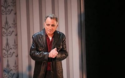 Actor Moshe Ivgy delivers a statement regarding sexual harassment allegations against him, at the end of a theater show in Tel Aviv on Sunday, February 7, 2016 (Flash90)