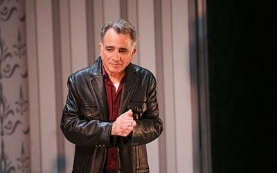 Actor Moshe Ivgy delivers a statement regarding sexual harassment allegations against him, at the end of a theater show in Tel Aviv on Sunday, February 7, 2016 (Flash90)