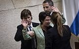 Joint List party member Hanin Zoabi is removed by Knesset security from the plenum session after refusing to leave the podium, February 8, 2016. (Hadas Parush/Flash90)