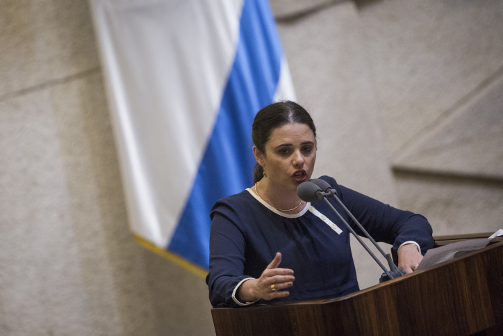 Justice Minister Ayelet Shaked speaks during a plenum session in the assembly hall of the Israeli parliament, before the Knesset votes on the proposed law requiring Left-wing foundations and organizations to reveal their sources of funding, on February 8, 2016. (Hadas Parush/Flash90) Justice Minister Ayelet Shaked speaks during a plenum session in the assembly hall of the Israeli parliament, before the Knesset votes on the proposed law requiring Left-wing foundations and organizations to reveal their sources of funding, on February 8, 2016. (Hadas Parush/Flash90)