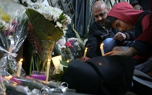 Mourners attend a candlelight vigil for slain Italian graduate student Giulio Regeni in front of the Italian embassy in Cairo, Egypt, Saturday, Feb. 6, 2016. (AP Photo/Amr Nabil) Mourners attend a candlelight vigil for slain Italian graduate student Giulio Regeni in front of the Italian embassy in Cairo, Egypt, Saturday, Feb. 6, 2016. (AP Photo/Amr Nabil)