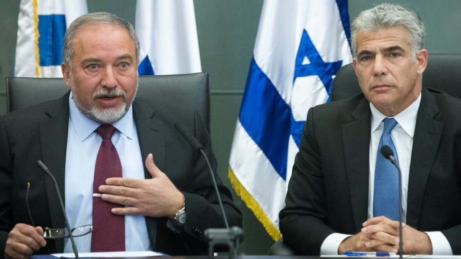 Leader of the Yesh Atid political party, Yair Lapid, and leader of the Yisrael Beytenu party, Avigdor Liberman, lead a joint conference in the Knesset regarding Israel's foreign policy. February 29, 2016. (Miriam Alster/FLASH90) Leader of the Yesh Atid political party, Yair Lapid, and leader of the Yisrael Beytenu party, Avigdor Liberman, lead a joint conference in the Knesset regarding Israel's foreign policy. February 29, 2016. (Miriam Alster/FLASH90)