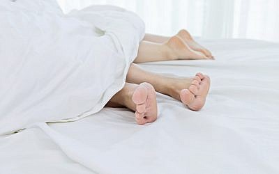 A couple in bed (iStock via JTA)