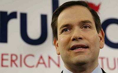 Republican presidential candidate, Sen. Marco Rubio, R-Florida, speaks to the media before he speaks to a crowd at Mount Paran Christian School, Saturday, Feb. 27, 2016, in Kennesaw, Georgia. (AP Photo/Mike Stewart)
