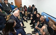 President Reuven Rivlin meets on February 8, 2016 with the family of slain border policewoman Hadar Cohen, who was killed five days earlier in a terror attack at Damascus Gate in Jerusalem. (Mark Neyman/GPO)