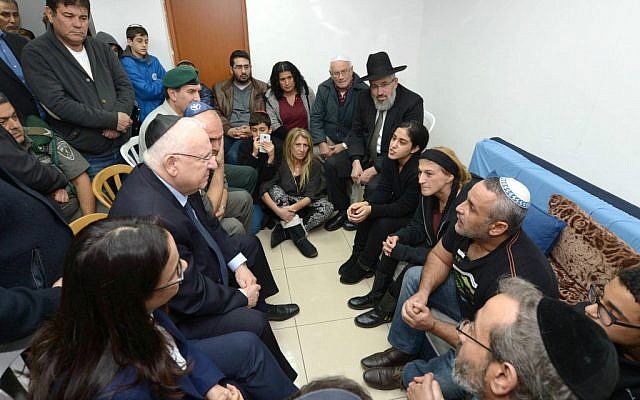 President Reuven Rivlin meets on February 8, 2016 with the family of slain border policewoman Hadar Cohen, who was killed five days earlier in a terror attack at Damascus Gate in Jerusalem. (Mark Neyman/GPO) President Reuven Rivlin meets on February 8, 2016 with the family of slain border policewoman Hadar Cohen, who was killed five days earlier in a terror attack at Damascus Gate in Jerusalem. (Mark Neyman/GPO)