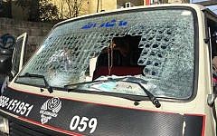 The windshield of a Palestinian vehicle, which was  smashed by an Israeli settler with an ax outside of the Karnei Shomron settlement on February 10, 2016. (Zachria Sadah/Rabbis for Human Rights)