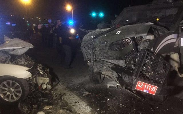 The scene of a crash near Ma'ale Adumim after a car carrying suspects (left) rammed a Border Police car, injuring three, February 13, 2016 (Israel Police) The scene of a crash near Ma'ale Adumim after a car carrying suspects (left) rammed a Border Police car, injuring three, February 13, 2016 (Israel Police)