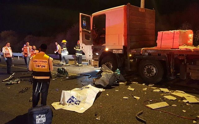 The scene of a deadly bus-truck collision on Route 1 on February 14, 2016 (ZAKA)
