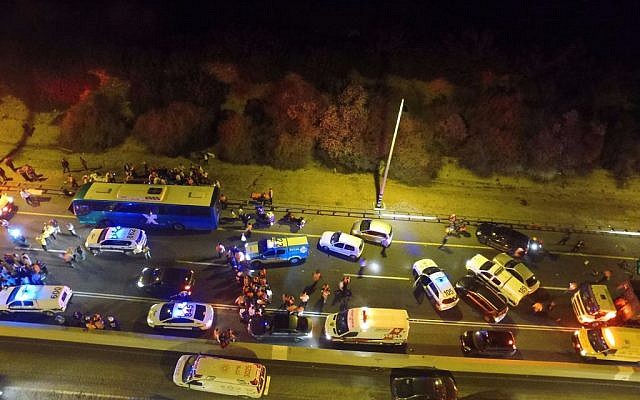 The scene of the deadly bus-truck collision on Route 1 (United Hatzalah)