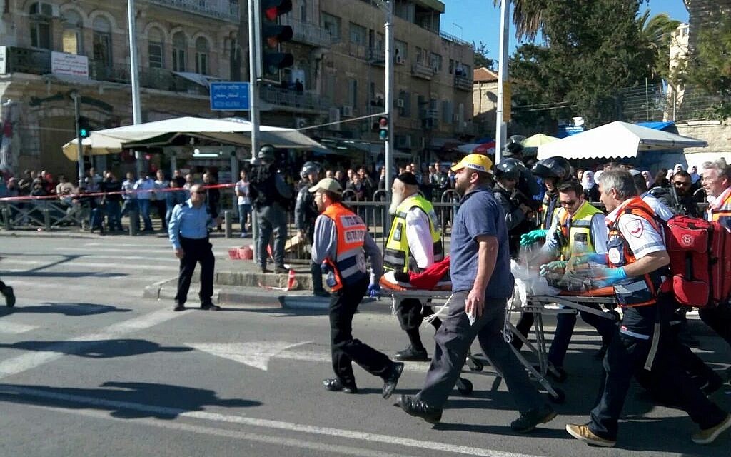 Police and medics at the scene of a shooting attack outside the Damascus Gate of Jerusalem's Old City on Wednesday, February 3, 2016 (Magen David Adom) Police and medics at the scene of a shooting attack outside the Damascus Gate of Jerusalem's Old City on Wednesday, February 3, 2016 (Magen David Adom)