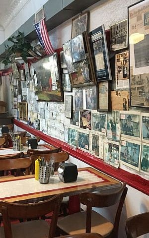 Woody Allen’s 2009 film 'Whatever Works,' starring Larry David, featured the Yonah Schimmel’s Knish Bakery’s dining area. (Cathryn J. Prince/The Times of Israel) Woody Allen’s 2009 film 'Whatever Works,' starring Larry David, featured the Yonah Schimmel’s Knish Bakery’s dining area. (Cathryn J. Prince/The Times of Israel)