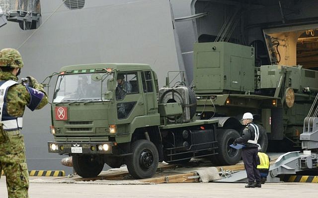 A vehicle carrying a PAC-3 missile interceptor arrives at a port on Ishigaki Island, Okinawa prefecture, southwestern Japan Saturday, Feb. 6, 2016, intended to fend off the threat of North Korea's missile arsenal. (Koji Harada/Kyodo News via AP) A vehicle carrying a PAC-3 missile interceptor arrives at a port on Ishigaki Island, Okinawa prefecture, southwestern Japan Saturday, Feb. 6, 2016, intended to fend off the threat of North Korea's missile arsenal. (Koji Harada/Kyodo News via AP)