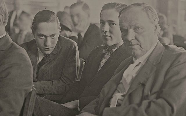 Nathan Leopold, left, and Richard Loeb, center, sitting in the courtroom with their defense attorney, Clarence Darrow, right. on July 24, 1924. (Courtesy of Chicago History Museum/via JTA)