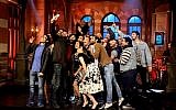 This photo from February 16, 2016, provided by OSN, shows actors taking a 'selfie' at the end of OSN's "Saturday Night Live Arabia," show in Cairo, Egypt.  (OSN via AP)