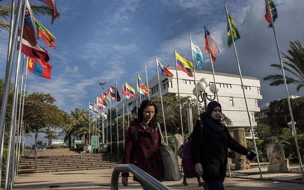 Students walk through the Tel Aviv University campus in Israel. (AP Photo/Tsafrir Abayov)