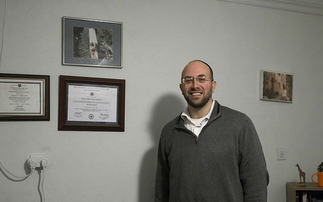 In this Friday, Jan. 29, 2016 photo, Dr. Elan Karten poses for a portrait at his office in Jerusalem. (AP Photo/Tsafrir Abayov) In this Friday, Jan. 29, 2016 photo, Dr. Elan Karten poses for a portrait at his office in Jerusalem. (AP Photo/Tsafrir Abayov)