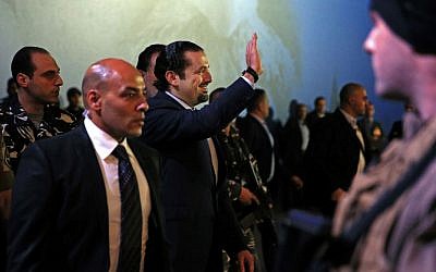 Former Lebanese Prime Minister Saad Hariri, waves as he arrives to a ceremony to mark the 11th anniversary of the assassination of his father, former Prime Minister Rafik Hariri, in Beirut, Lebanon, Sunday, Feb. 14, 2016. (AP Photo/Hassan Ammar)