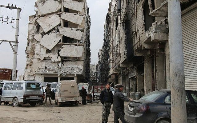 A building is seen with heavy damage in Aleppo, Syria, February 11, 2016. (Alexander Kots/Komsomolskaya Pravda via AP)