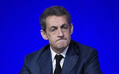 French right-wing Les Republicains (LR) party President, Nicolas Sarkozy attends the LR National Council on February 14, 2016 in Paris. (AFP PHOTO / LIONEL BONAVENTURE) 
