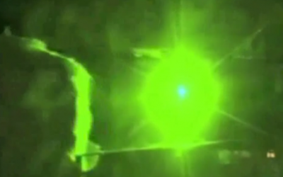 Illustrative: Laser beam attack on a plane (CNN screenshot)