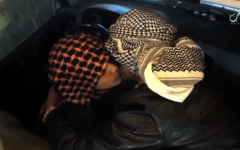 The father of an Islamic State teen suicide bomber kisses his son before sending him off. (screen capture: VideoPress)