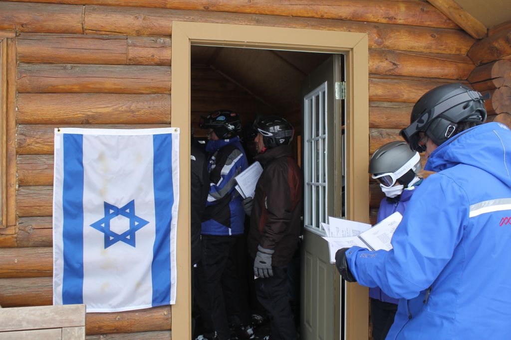 An Israeli flag is posted at Deer Valley's Sunset Cabin every Friday afternoon to alert skiers to the weekly Kabbalat Shabbat service. (Uriel Heilman/JTA) An Israeli flag is posted at Deer Valley's Sunset Cabin every Friday afternoon to alert skiers to the weekly Kabbalat Shabbat service. (Uriel Heilman/JTA)