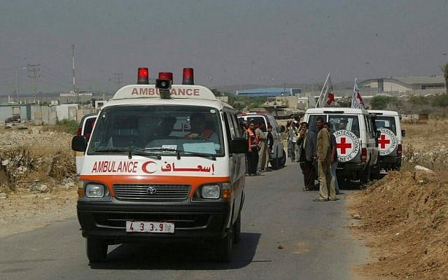 Illustrative: International Red Cross members securing transport for sick Palestinians from Gaza into Israel for medical treatment at the Erez Crossing on June 19, 2007. (Ahmad Khateib/Flash90) Illustrative: International Red Cross members securing transport for sick Palestinians from Gaza into Israel for medical treatment at the Erez Crossing on June 19, 2007. (Ahmad Khateib/Flash90)