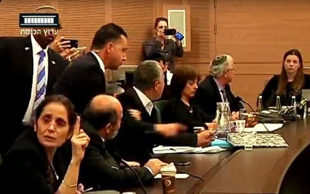 The Knesset's Constitution, Law and Justice Committee erupts in angry debate on February 29, 2016, and a Knesset security staffer prepares to eject MK Abdullah Abu Maaruf (Knesset channel screenshot) The Knesset's Constitution, Law and Justice Committee erupts in angry debate on February 29, 2016, and a Knesset security staffer prepares to eject MK Abdullah Abu Maaruf (Knesset channel screenshot)