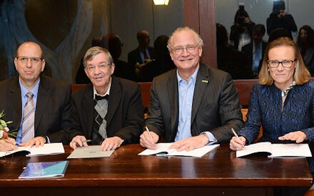 (Left to right) Amir Naiberg of Yeda Weizmann; Prof. Mudi Sheves of the Weizmann Institute; Stefan Oschmann of Merck; and Belén Garijo of Merck (Courtesy) (Left to right) Amir Naiberg of Yeda Weizmann; Prof. Mudi Sheves of the Weizmann Institute; Stefan Oschmann of Merck; and Belén Garijo of Merck (Courtesy)
