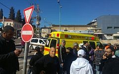 Emergency services at the site of a stabbing attack in Ramle, January 4, 2016. (Magen David Adom)