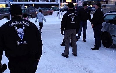 A group of men calling themselves the Soldiers of Odin, a Finnish group claiming to protect locals from asylum seekers, February 5, 2016. (AFP/Sam Kingsley)