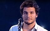 Amir Haddad performs on the French version of reality singing show The Voice in 2014 (screen capture: YouTube)