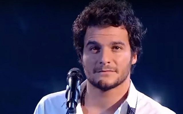 Amir Haddad performs on the French version of reality singing show The Voice in 2014 (screen capture: YouTube)
