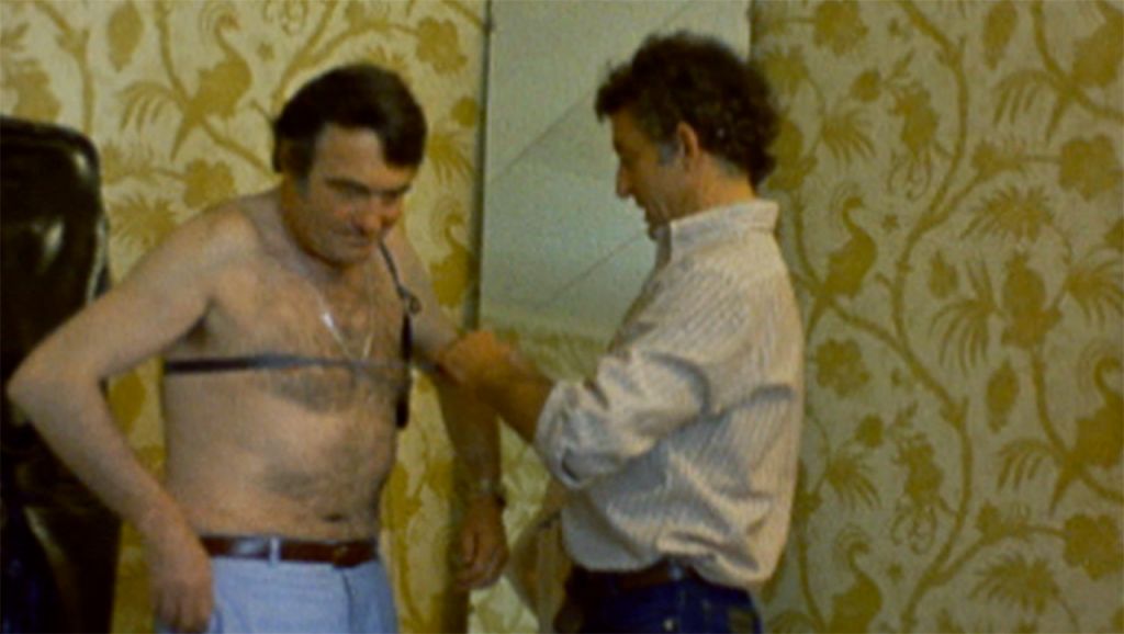 Filmmaker Claude Lanzmann is fitted with a hidden microphone to record Nazi testimony, circa 1978. (Image courtesy of the United States Holocaust Memorial Museum/Yad Vashem) Filmmaker Claude Lanzmann is fitted with a hidden microphone to record Nazi testimony, circa 1978. (Image courtesy of the United States Holocaust Memorial Museum/Yad Vashem)