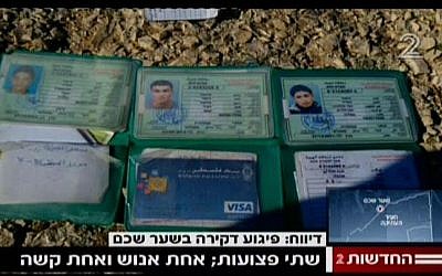 The ID cards of the three Palestinians who stabbed and fired at Border Policewomen at Damascus Gate in Jerusalem on February 3, 2016, killing Hadar Cohen (Channel 2 screenshot)