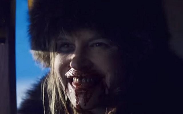 Jennifer Jason Leigh as Daisy Domergue in 'The Hateful Eight' (screen capture: YouTube)