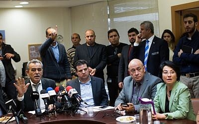 Joint Arab List members Jamal Zahalka (L), Hanin Zoabi (R), Basel Ghattas (2R) and Leader of the Joint Arab list, Ayman Odeh at the weekly Joint Arab list meeting at the Knesset, Israel's parliament in Jerusalem on February 8, 2016. Photo by Yonatan Sindel/Flash90.