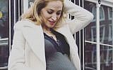 Channel 10 anchor Miri Michaeli Schwartz poses at 8.5 months of pregnancy. (Screen capture Miri Michaeli/ Instagram)