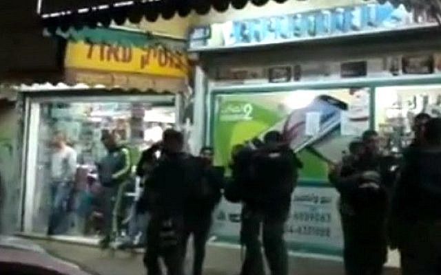 Security forces at the scene of a stabbing attack in the Bedouin city of Rahat on February 6, 2016. (screen capture: YouTube) Security forces at the scene of a stabbing attack in the Bedouin city of Rahat on February 6, 2016. (screen capture: YouTube)