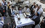 Reform female and male rabbis pray together at Robinson's Arch, the Western Wall site slated for future egalitarian services, on February 25, 2016. (Y.R/Reform Movement)
