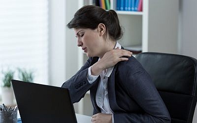 (Stressed woman image via Shutterstock)
