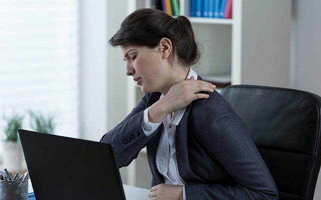 (Stressed woman image via Shutterstock)