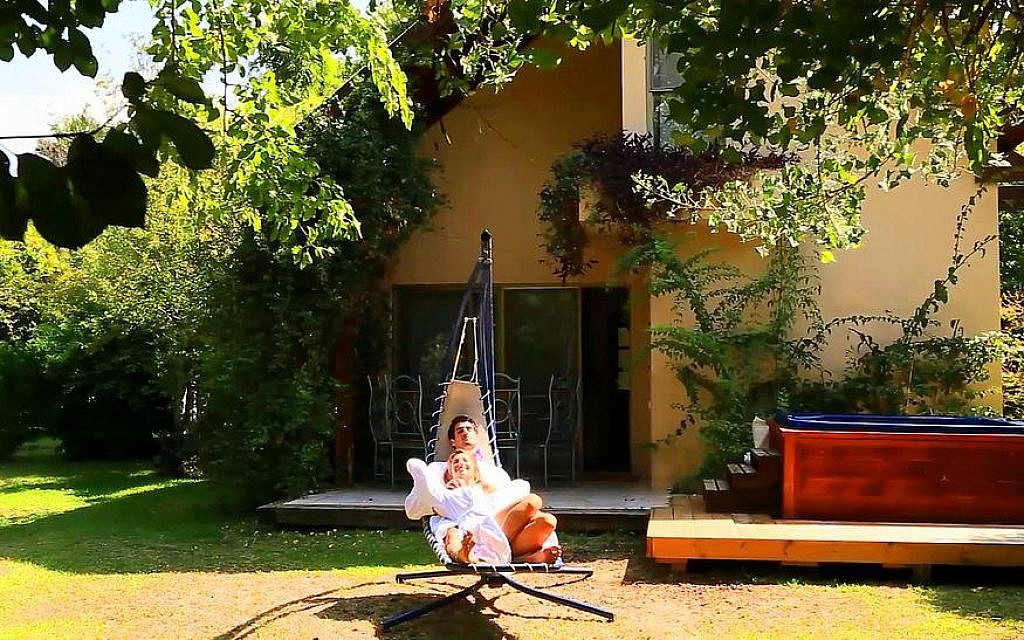 Relaxing in a hammock at Villa Vitrage, where the Olshinski family helps defray costs by asking paying guests to pay for homemade soup (Courtesy Refanah) Relaxing in a hammock at Villa Vitrage, where the Olshinski family helps defray costs by asking paying guests to pay for homemade soup (Courtesy Refanah)