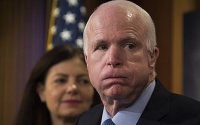 US Senator John McCain (R), R-Arizona, and US Senator Kelly Ayotte (L), R-New Hampshire, talk about US President Barack Obama's plan to close the Guantanamo Bay prison during a press conference on Capitol Hill in Washington, DC, February 24, 2016. (AFP / JIM WATSON)