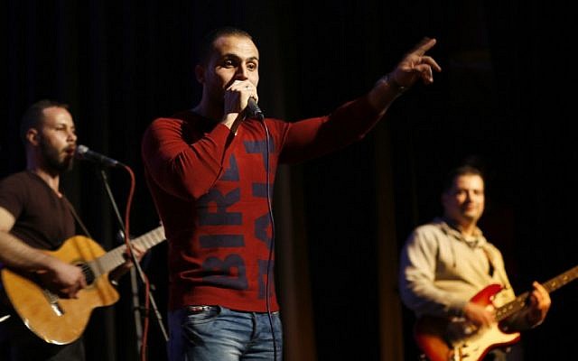 Palestinian group "Watar Band" perform during a concert in Gaza City on February 25, 2016. (AFP / MOHAMMED ABED)