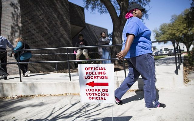 An official polling location sign stands outside a voting center on Super Tuesday, Dallas, Texas. March 1, 2016.
(AFP/Laura Buckman) An official polling location sign stands outside a voting center on Super Tuesday, Dallas, Texas. March 1, 2016.
(AFP/Laura Buckman)