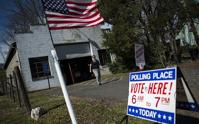 A woman leaves the Old Etlan rescue squad building, used as a county voting location, during the Super Tuesday primary voting, Etlan, Virginia, March 1, 2016.
(AFP / Andrew Caballero-Reynolds) A woman leaves the Old Etlan rescue squad building, used as a county voting location, during the Super Tuesday primary voting, Etlan, Virginia, March 1, 2016.
(AFP / Andrew Caballero-Reynolds)